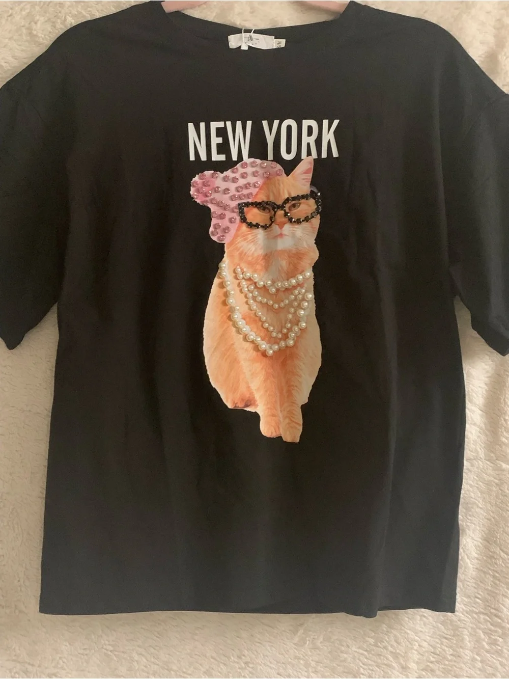 Black Cat Graphic Tee with Pink Accents - Pearl Necklace Design